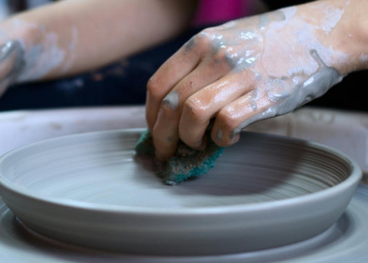 How Do You Address Issues Such as Warping or Uneven Drying in Wheel-Thrown Pottery?